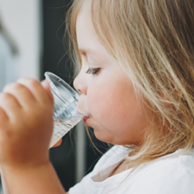 Toddler get a drink of watere